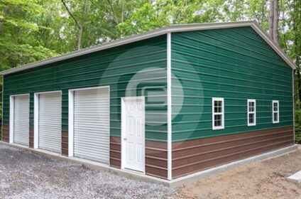 30x41x12 side entry metal garage with three roll-up doors, one walk door and three windows in green with brown wainscoting