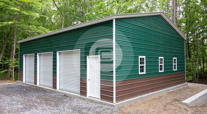 30x41x12 side entry metal garage with three roll-up doors, one walk door and three windows in green with brown wainscoting
